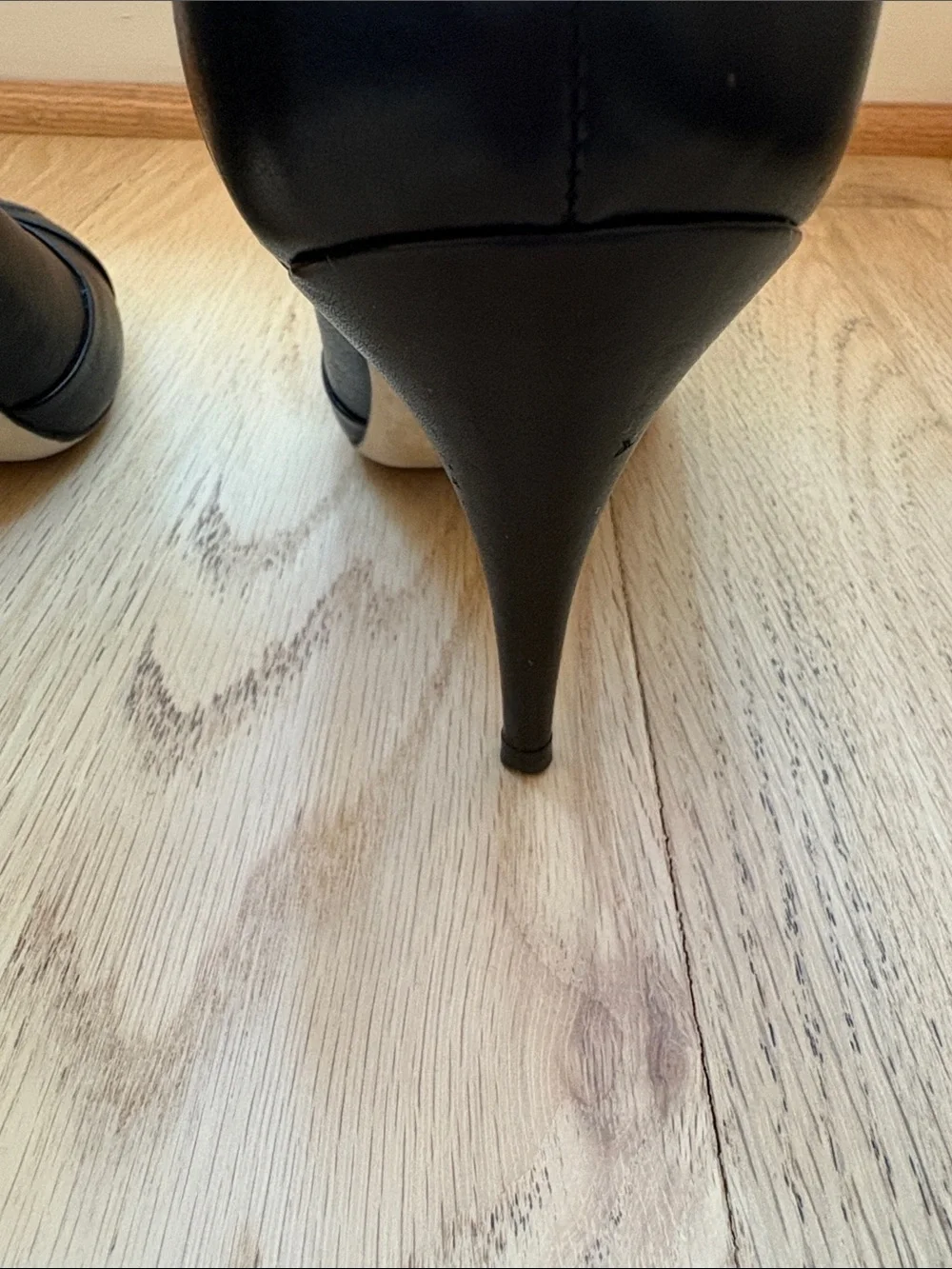 CHANEL Black Leather Ankle Booties with Bow-Trim and CC Toe